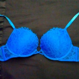 Blue lace Victoria Secret Bombshell bra with sparkly straps